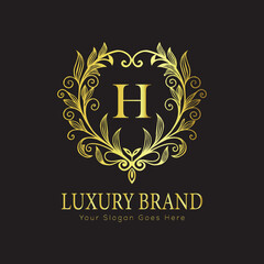 Letter Luxury brand logo design with a royal gold crown emblem and elegant typography
