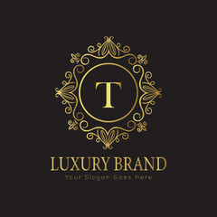 Letter Luxury brand logo design with a royal gold crown emblem and elegant typography
