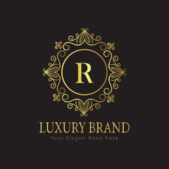 Letter Luxury brand logo design with a royal gold crown emblem and elegant typography
