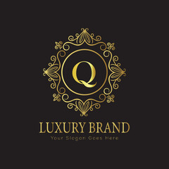 Letter Luxury brand logo design with a royal gold crown emblem and elegant typography
