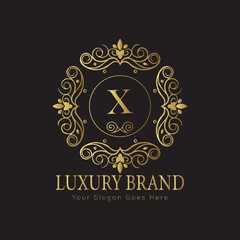 Letter Luxury brand logo design with a royal gold crown emblem and elegant typography
