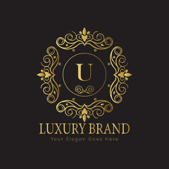 Letter Luxury brand logo design with a royal gold crown emblem and elegant typography
