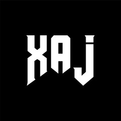 Obraz premium XAJ letter logo design for technology company. XAJ logo design black and white color combination. XAJ logo, XAJ vector, XAJ design, XAJ icon, XAJ alphabet. XAJ typography logo design.