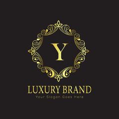 Letter Luxury brand logo design with a royal gold crown emblem and elegant typography

