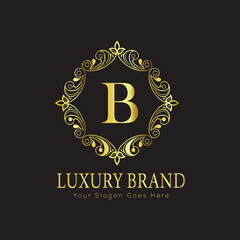 Letter Luxury brand logo design with a royal gold crown emblem and elegant typography
