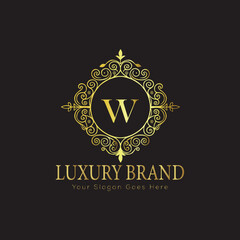 Letter Luxury brand logo design with a royal gold crown emblem and elegant typography

