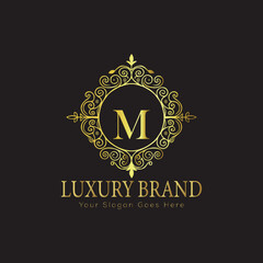 Letter Luxury brand logo design with a royal gold crown emblem and elegant typography
