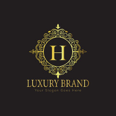 Letter Luxury brand logo design with a royal gold crown emblem and elegant typography
