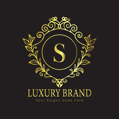 Letter Luxury brand logo design with a royal gold crown emblem and elegant typography
