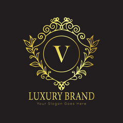 Letter Luxury brand logo design with a royal gold crown emblem and elegant typography
