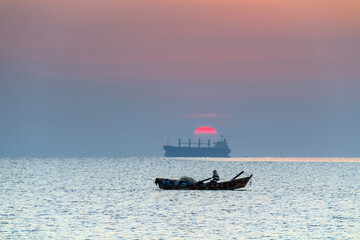 Naklejka premium Tunisian Fishermen Braving the Seas for Fresh Catches