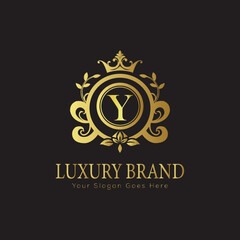 Letter Luxury brand logo design with a royal gold crown emblem and elegant typography