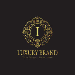 Letter Luxury brand logo design with a royal gold crown emblem and elegant typography