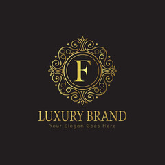Letter Luxury brand logo design with a royal gold crown emblem and elegant typography