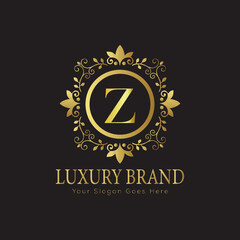 Letter Luxury brand logo design with a royal gold crown emblem and elegant typography