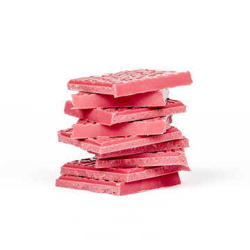 stack of ruby chocolate on white background