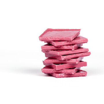 stack of ruby chocolate on white background