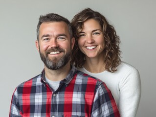 a couple poses for a portrait