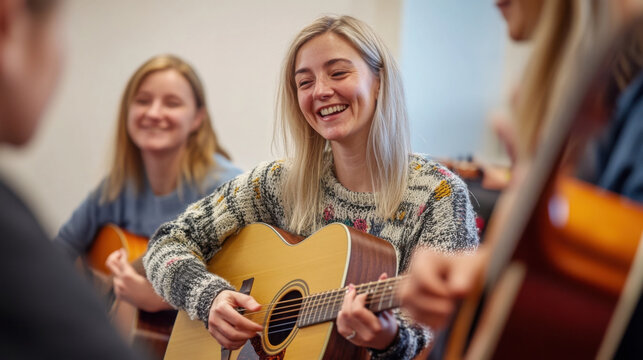 Group of adults enjoying acoustic guitar lessons in a classroom setting