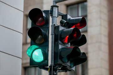 Green traffic light and red pedestrian light for traffic control signaling