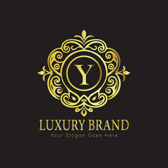 Letter Luxury brand logo design with a royal gold crown emblem and elegant typography
