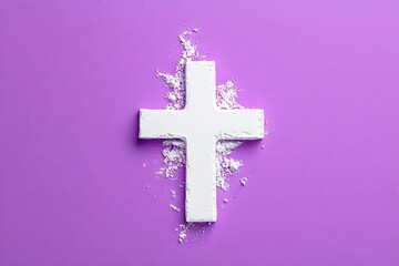 Obraz premium A Christian cross made of ashes set against a deep purple backdrop with room for text