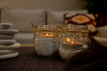 Experience the Cozy Candlelight Decor featuring Elegant Jars that create a Relaxing Atmosphere