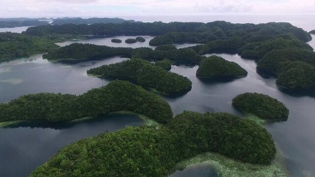 Palau and Koror Island Area with Many Small Islets in Background. Coral Reefs and Lagoon. Drone.