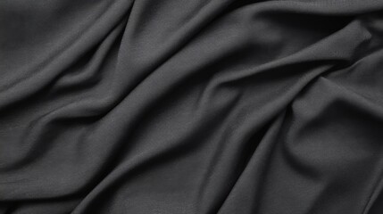 Fototapeta premium Draped dark gray fabric texture background. (1)