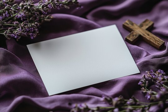 Christian religious wooden cross with a violet ribbon on a purple background. A symbol of the Catholic faith. Represents concepts of Good Friday, Lent, Palm Sunday, Ash Wednesday, and Holy Week. Room