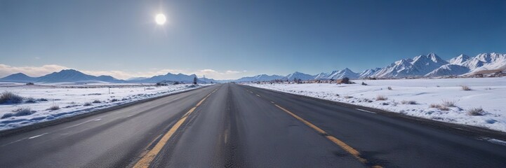 Naklejka premium Snowy road under a clear blue sky with no clouds, white snow, vast space