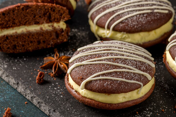 Whoopie pie with orange cream. Delicious homemade dessert