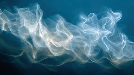 Abstract swirling white smoke on dark blue background.