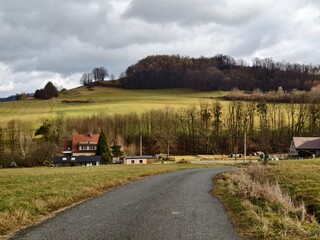 small asphalt road in a rural landscape