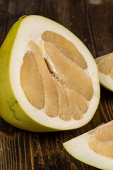 ripe pomelo with lots of pulp cut into pieces