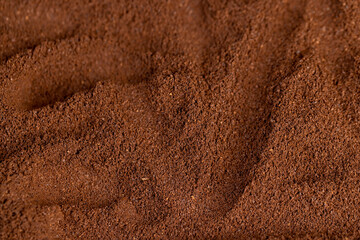 a large amount of ground coffee powder close  up