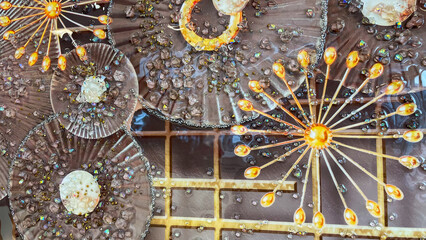 Abstract design with intricate circular patterns, sparkling textures, and golden accents. Suitable...