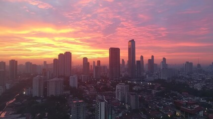 Obraz premium Manila Skyline Sunset: A City's Golden Hour
