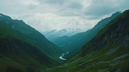 Fototapeta premium Serene Mountain Valley Landscape: A Breathtaking Vista of Alpine Majesty