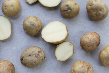 Fototapeta premium Raw fresh organic potatoes, Tiny potatoes