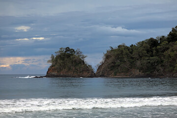 View of the Banca islita cape in cloudy weather. Islita beach of the Pacific Ocean. Guanacaste province, Nicoya Peninsula. Costa Rica, Central America
