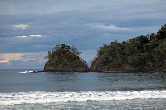 View of the Banca islita cape in cloudy weather. Islita beach of the Pacific Ocean. Guanacaste province, Nicoya Peninsula. Costa Rica, Central America