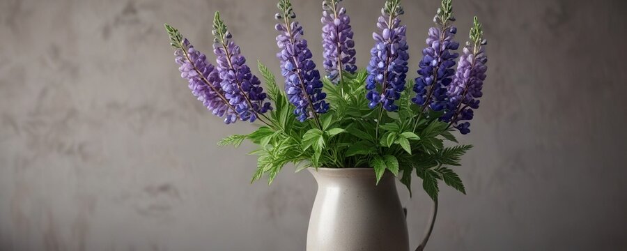 Lupinus mutabilis flowers in a vase with greenery, floral decor, greenery arrangement, colorful vases