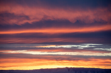 Dark stormy dramatic sunset with clouds 