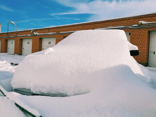 car in snow at street