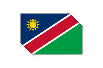 Namibia flag - rectangle colorful flag representing a country cultural identity and heritage. The essence of national pride and unity. Attached by the corners in a paper album