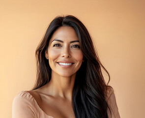 portrait headshot of 40 year old latina model with smooth long hair for skincare or hair care ad on orange background with space for text or logo