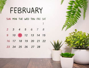 Day11 of february month, Wooden calendar with date. Empty space for text