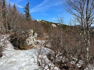The last remnants of spring snow after a long and harsh mountain winter - Northern Velebit National...