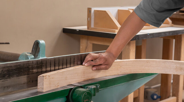 carpenter - craftsman applying wood bending technique